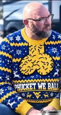 Wearing the Phucket We Ball ugly sweater at a tailgate
